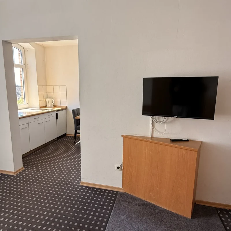 Zimmer im Hotel In Amberg mit Bett und Flachbild-TV